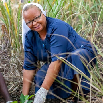 Patron of the Global Warming Club, Holy Child School, Rev. sister Gifty Abane planting a tree