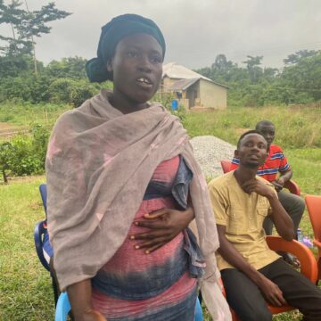 A participant contributing some suggestions at a meeting with the project team