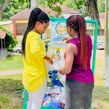 Students making use of the plastic waste recycling bins on the CCTU campus