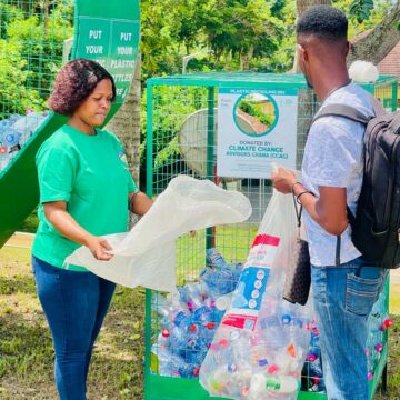 Students making use of the plastic waste recycling bins on the CCTU campus